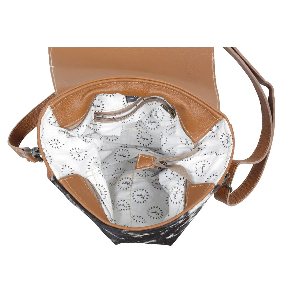 MANGNIFIQUE HAND-CONCEALED BAG