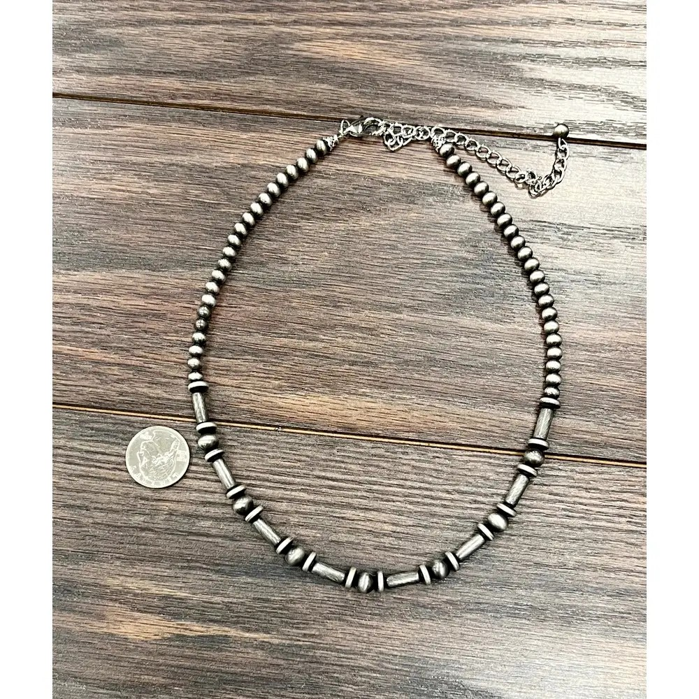 LONG AND FLAT BEAD NAVAJO NECKLACE